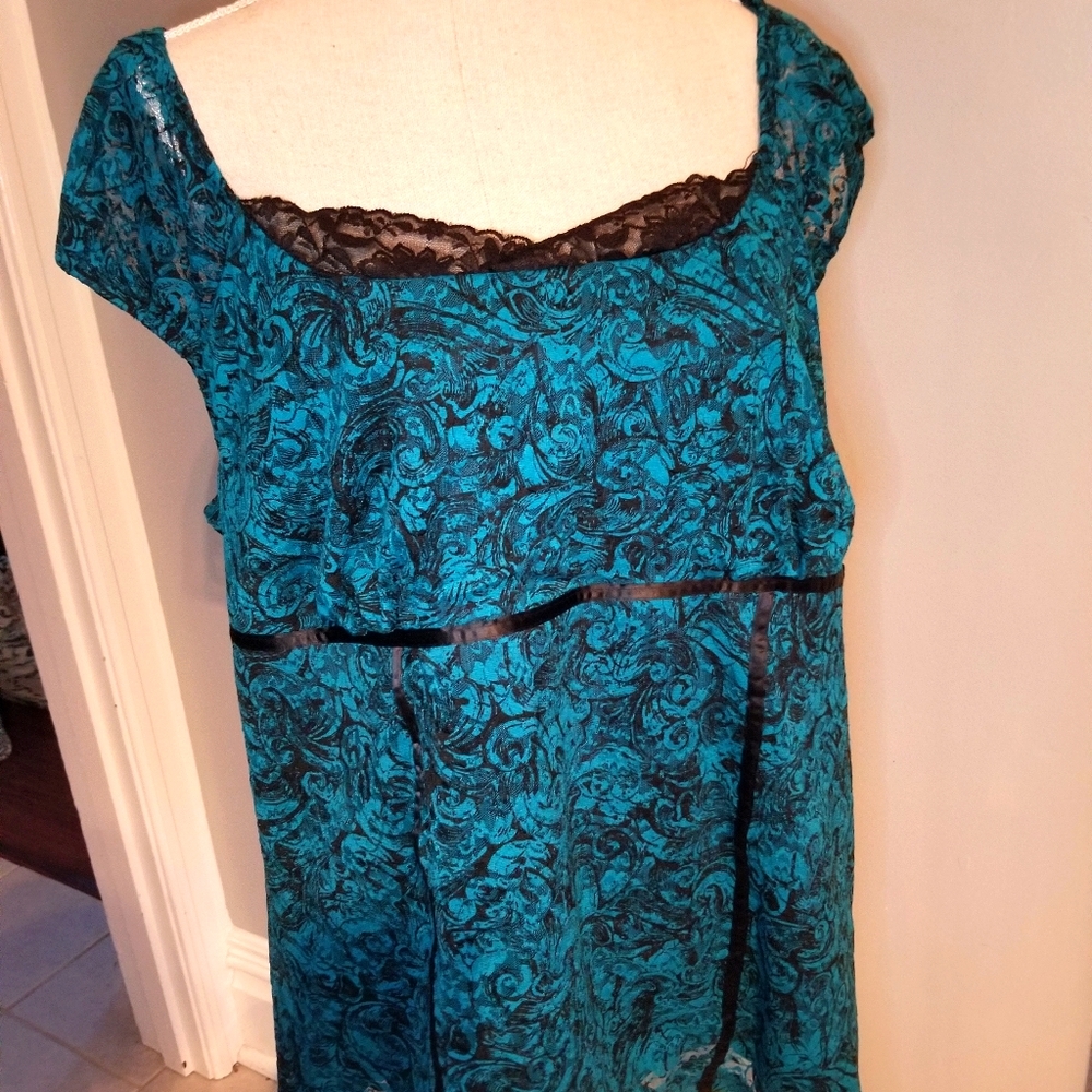 Teal lace shell with cap sleeves and ribbon accent